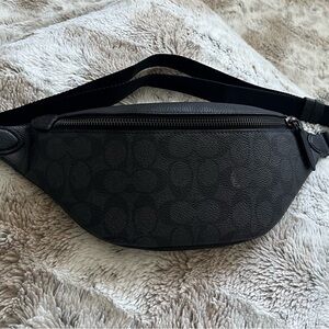Coach Charter Belt Bag 7 in black with signature Coach logo